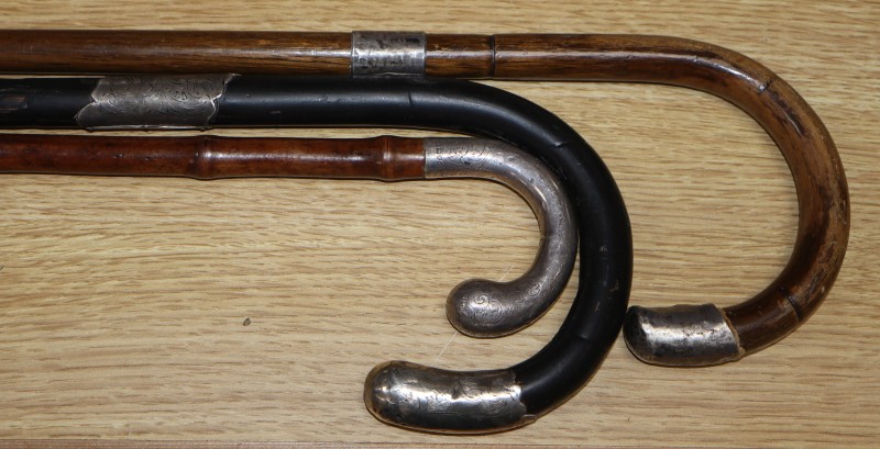 Three silver mounted walking canes